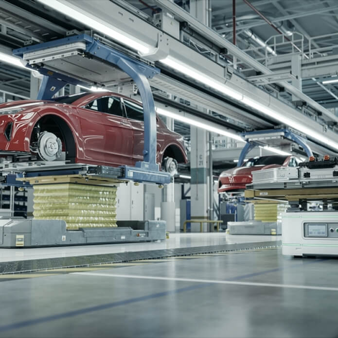 EV Production Line on Advanced Automated Smart Factory. High Performance Electric Car Manufacturing. Car Batteries Installation to Electric Vehicles on Assembly line. AGV Transport Batteries.