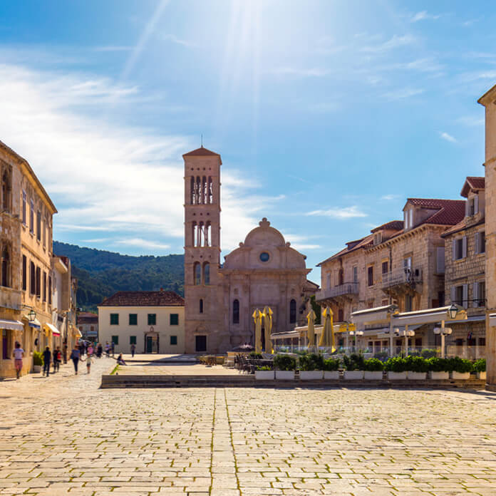 Main square in old medieval town Hvar. Hvar is one of most popular tourist destinations in Croatia in summer. Central Pjaca square of Hvar town, Dalmatia, Croatia.
