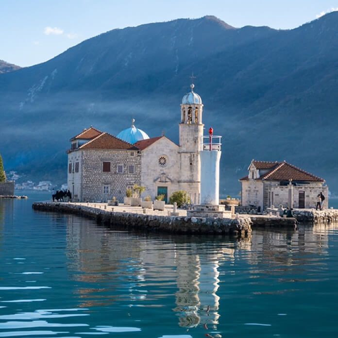 Saint George Island and Church of Our Lady of the Rocks near Perast in Montenegro. Boka Kotor bay, Europe. . High quality photo