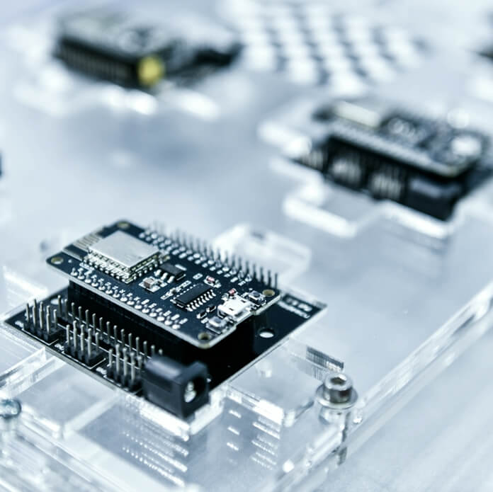 Macro Shot of Computer Processor Production Line print circuit board (PCB) in Bright Environment in Factory.