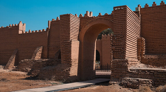 Exploring ancient ruins of Babylon in Iraq during a clear sunny day