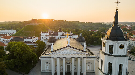 Aerial View of Vilnius Cathedral With Bell Tower and Gediminas Castle on the Hill on Sunrise