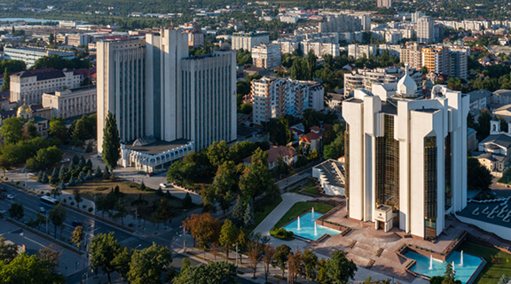 Aerial drone view of Presidency building with at sunrise in chisinau with blue sky, Moldova