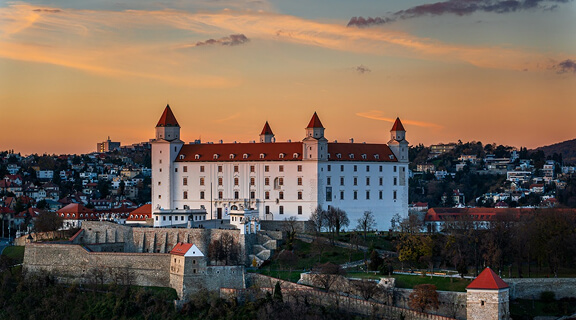 Bratislava castle on the hill over Danube river after sunset in the Bratislava old town, capital of Slovakia