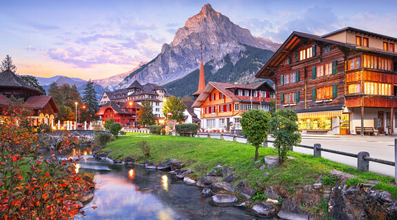 Kandersteg, Switzerland scenic town view at twilight in autumn season.